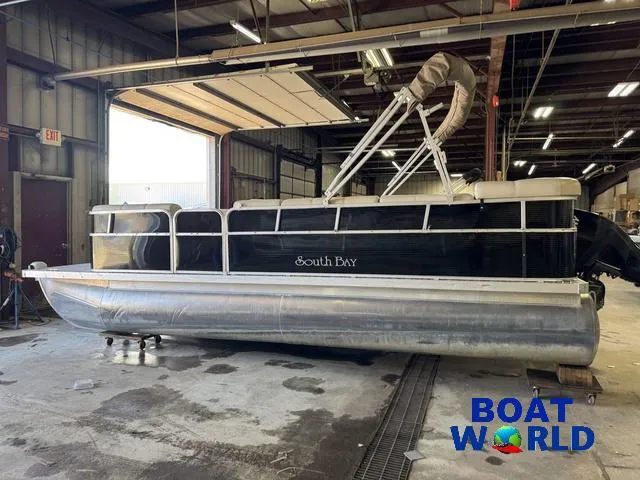 Slide: The Image of 2008 South Bay 20' Cruise Pontoon with Mercury 60HP engine in a warehouse. - 40