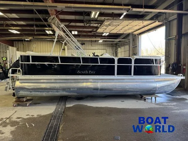 Slide: The Image of 2008 South Bay 20' Cruise Pontoon with Mercury 60HP engine in a warehouse. - 48