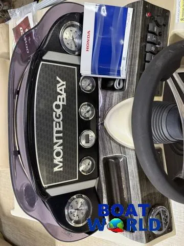 Slide: The Image of Control panel of 2019 Montego Bay 8518 Cruise with Honda 60HP engine manual. - 12