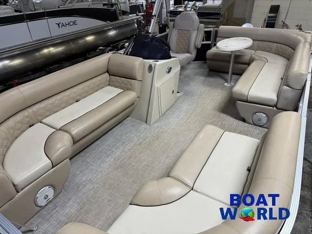 Slide: The Image of Luxurious 2019 Montego Bay 8518 Cruise pontoon boat interior with beige seating and table. - 3