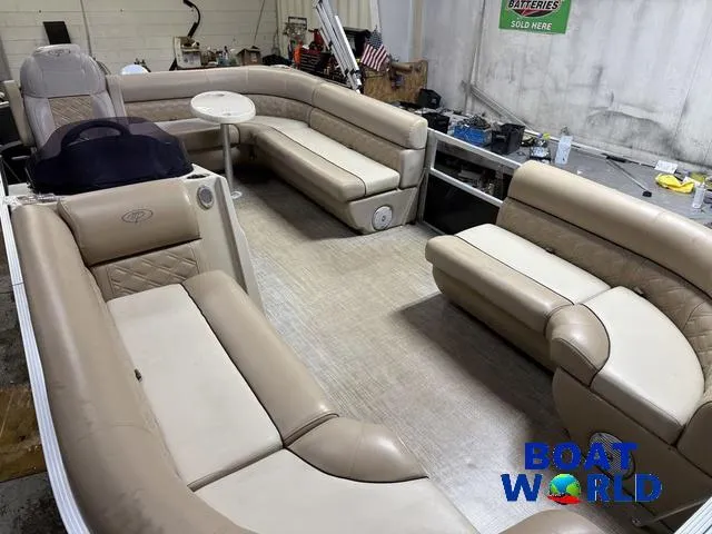 Slide: The Image of 2019 Montego Bay 8518 Cruise boat interior with beige seating and table, featuring Honda 60HP engine. - 4