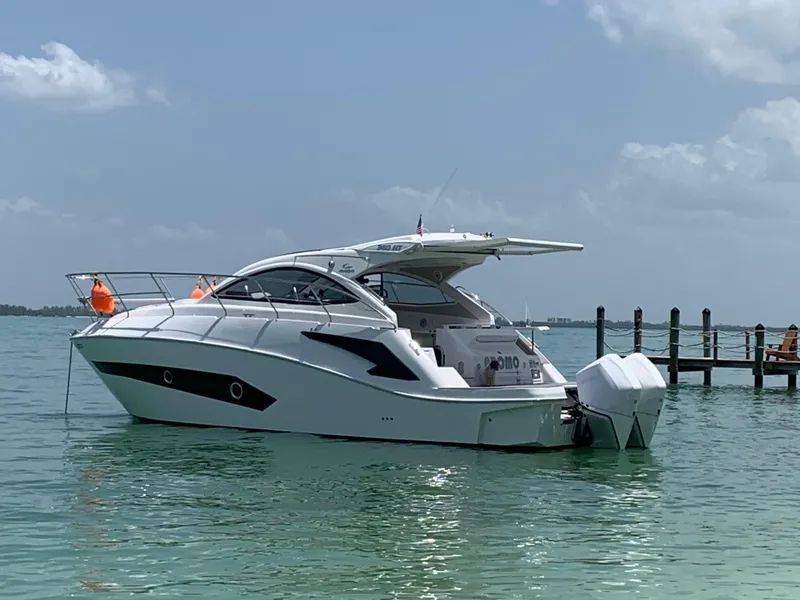 Slide: The Image of 2022 Evolve 360HT yacht on calm water, clear sky background. - 22