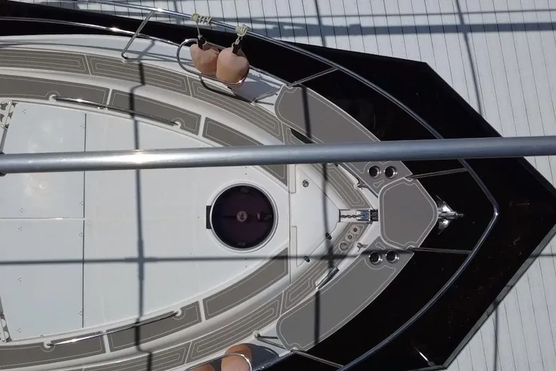 Slide: The Image of Overhead view of 2022 Evolve 360HT yacht deck with modern design elements. - 49