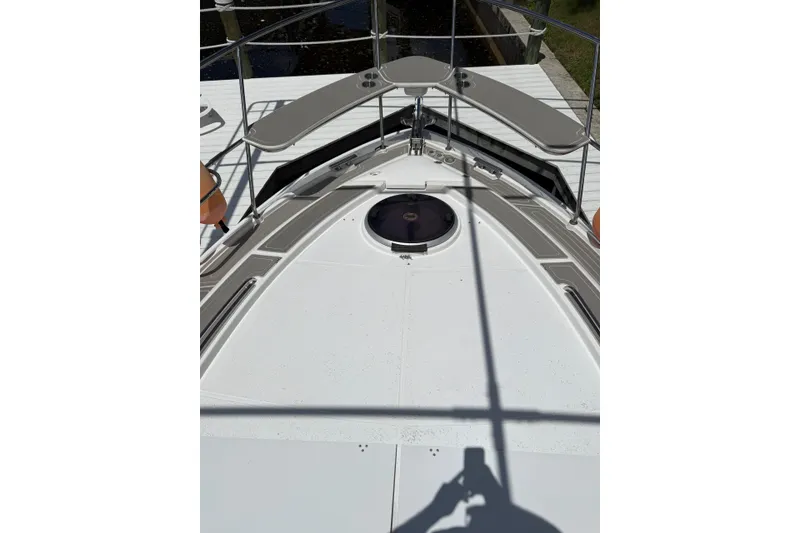 Slide: The Image of Bow view of 2022 Evolve 360HT yacht with sleek deck design. - 52
