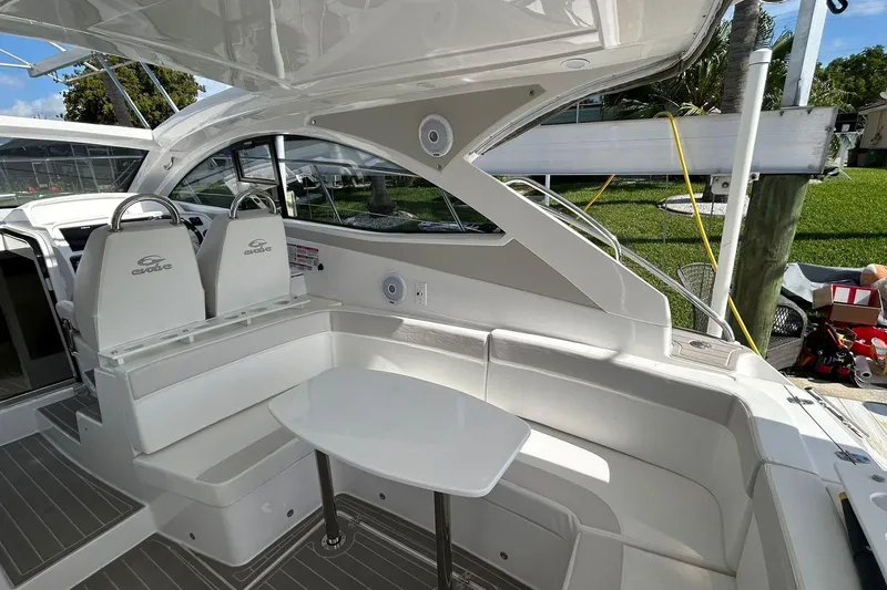 Slide: The Image of Luxury seating area on 2021 Evolve 360HT yacht, featuring sleek design and modern amenities. - 58
