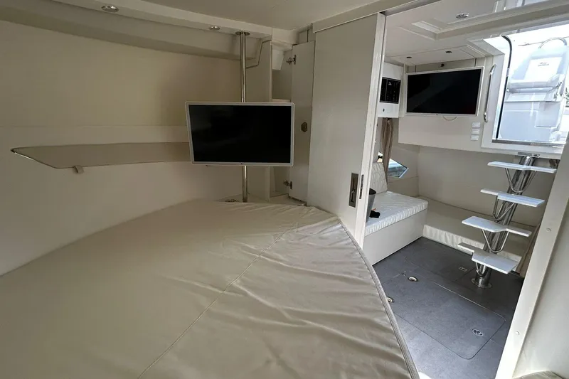 Slide: The Image of Modern interior of 2021 Evolve 360HT yacht with TV and sleek design. - 78