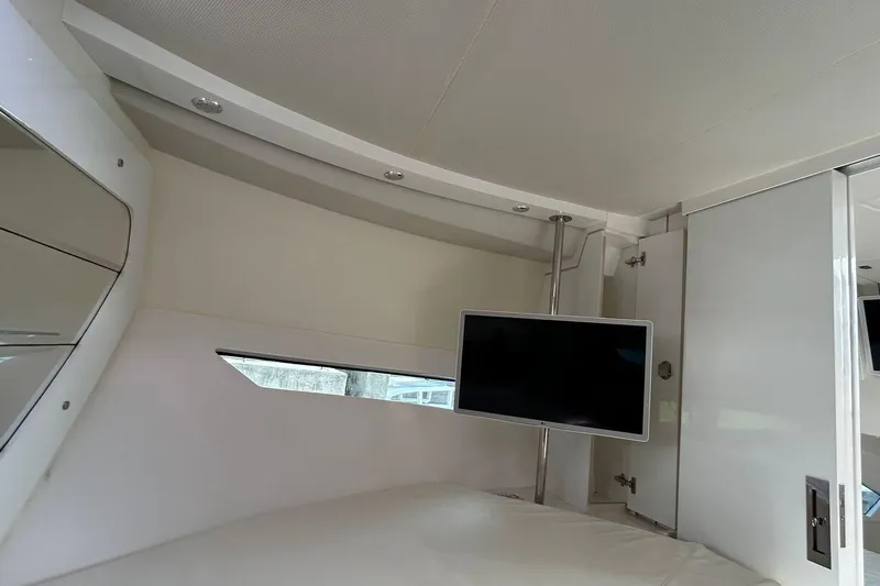 Slide: The Image of Interior of 2021 Evolve 360HT yacht with mounted TV and modern design. - 80