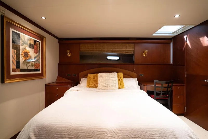 Slide: The Image of Luxurious bedroom in 2004 Cheoy Lee 84 Bravo Flybridge yacht with elegant decor. - 23