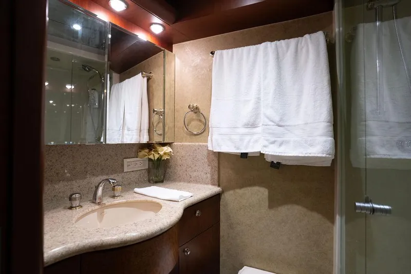 Slide: The Image of Luxurious bathroom in 2004 Cheoy Lee 84 Bravo Flybridge yacht with elegant fixtures. - 30
