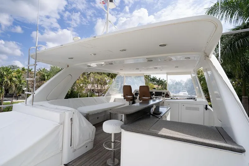 Slide: The Image of 2004 Cheoy Lee 84 Bravo Flybridge yacht with spacious seating and modern amenities. - 40