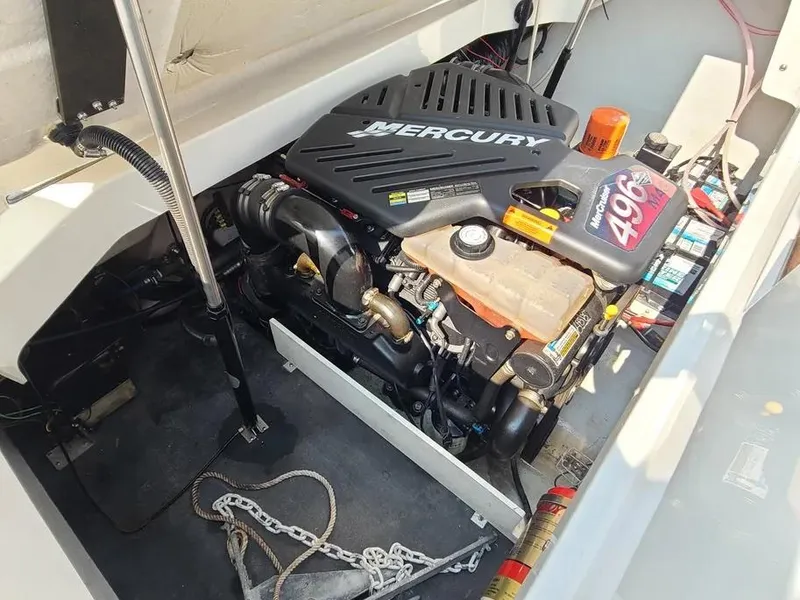 Slide: The Image of Engine compartment of a 2003 Cobalt 263 boat with a Mercury 496 engine. - 13