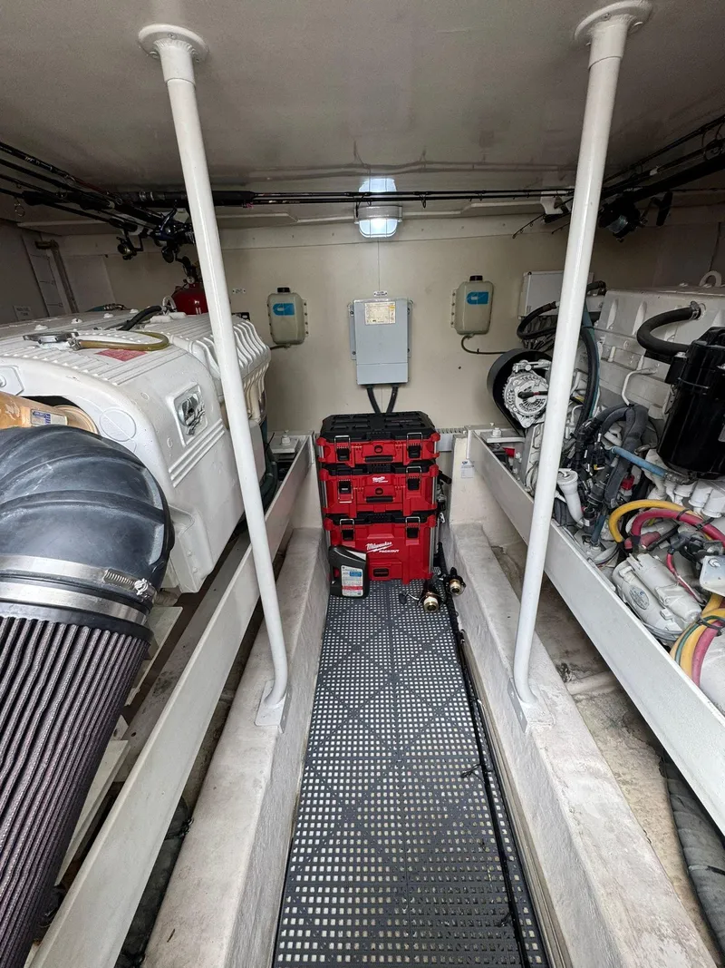 Slide: The Image of Engine room of 2007 Luhrs 41 Express boat, featuring organized equipment and machinery. - 31