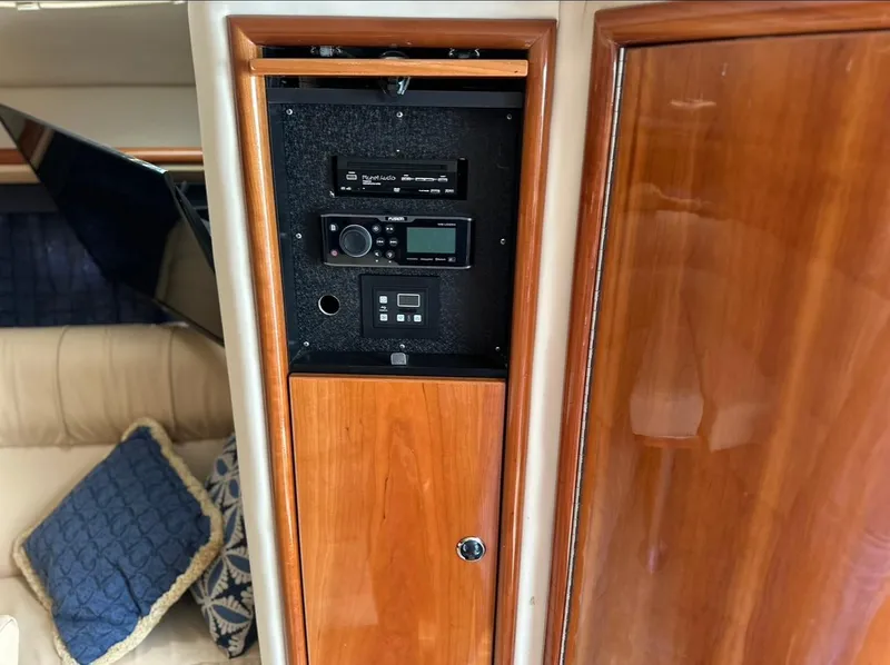 Slide: The Image of 2005 Cobalt 360 interior with wooden panel and control system. - 15