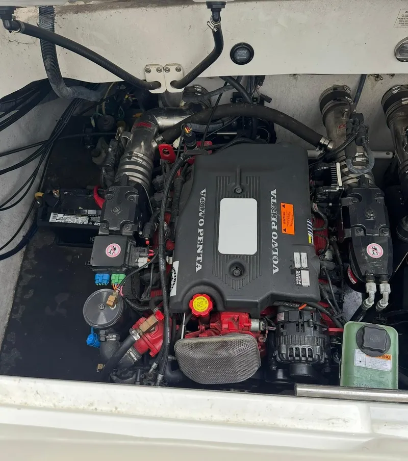 Slide: The Image of Engine compartment of a 2005 Cobalt 360 boat featuring a Volvo Penta engine. - 17
