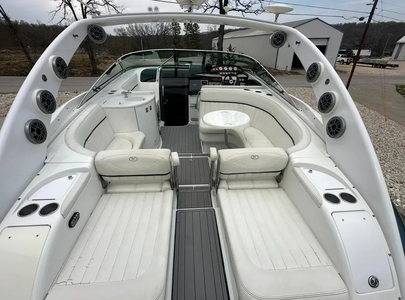 Slide: The Image of Luxurious 2005 Cobalt 360 boat interior with white seating and modern amenities. - 9