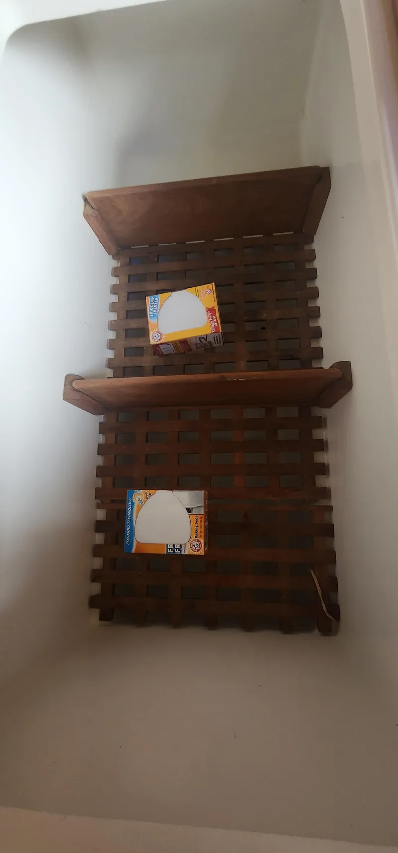 Slide: The Image of Wooden grate with two boxes inside a Tartan 37 sailboat, 1982 model. - 16