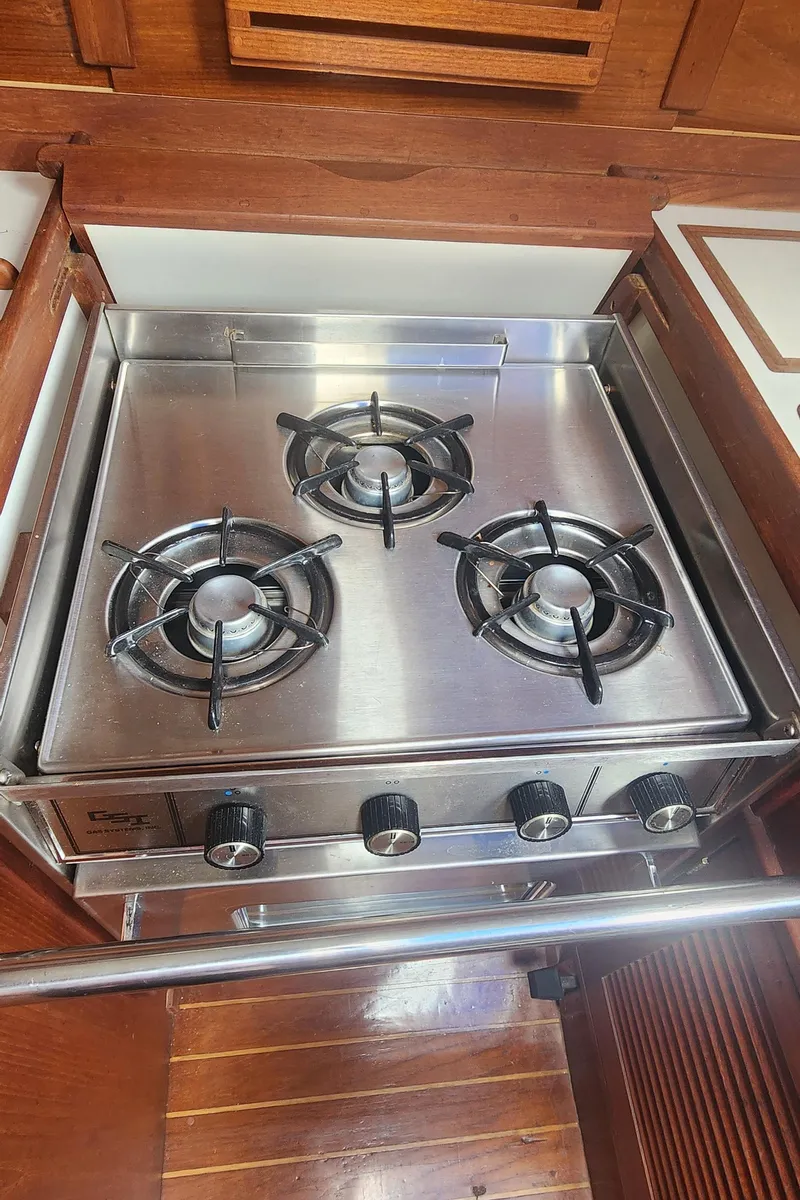 Slide: The Image of Stainless steel stove with four burners on a 1982 Tartan 37 yacht. - 31