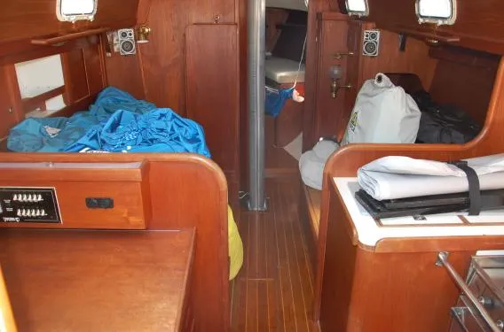 Slide: The Image of Interior of 1982 Tartan 37 sailboat with wooden finish and nautical equipment. - 7