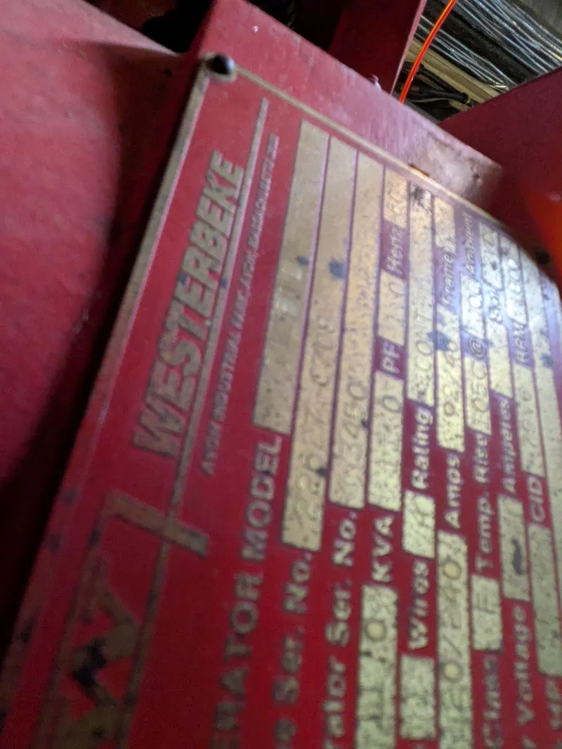 Slide: The Image of Close-up of a Westerbeke engine plate on a 1988 Sea Ray 460 Express Cruiser. - 34