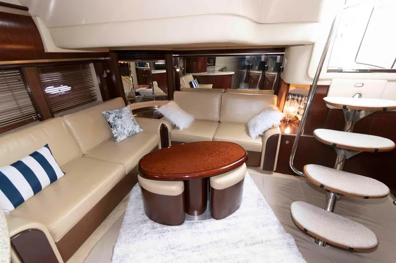 Slide: The Image of Luxurious interior of a 2005 Sea Ray 500 Sundancer yacht with elegant seating and modern decor. - 16