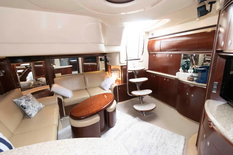 Slide: The Image of Luxurious interior of a 2005 Sea Ray 500 Sundancer yacht with elegant seating and modern design. - 18