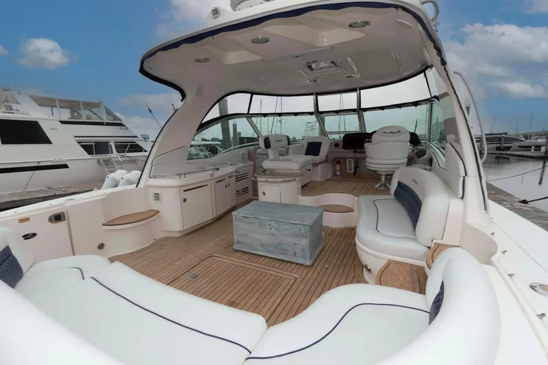 Slide: The Image of 2005 Sea Ray 500 Sundancer yacht interior with spacious seating and elegant design. - 4