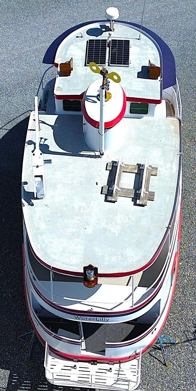Slide: The Image of Overhead view of a 1997 Florida Bay Coasters 35 boat with solar panels. - 6