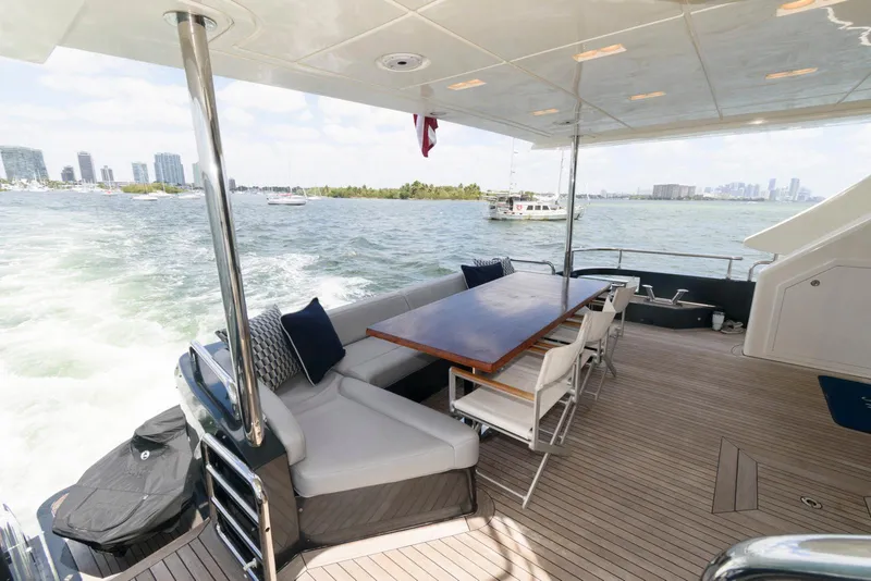 Slide: The Image of Luxurious 2013 Azimut 84 Flybridge Motor Yacht deck with seating and ocean view. - 11