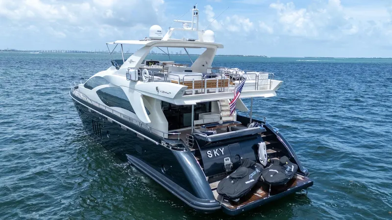 Slide: The Image of 2013 Azimut 84 Flybridge Motor Yacht cruising on open water. - 3