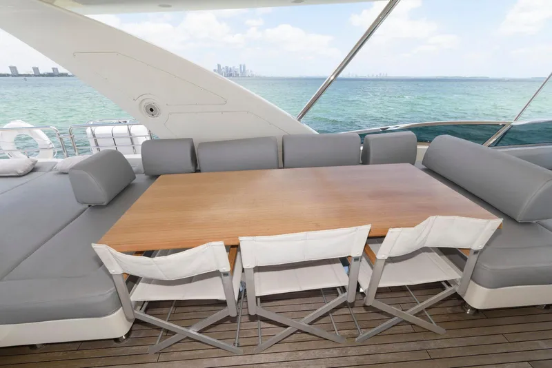 Slide: The Image of Luxurious Azimut 84 Flybridge Motor Yacht 2013 with elegant outdoor dining area and ocean view. - 31