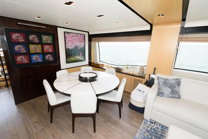 Slide: The Image of Luxurious interior of 2013 Azimut 84 Flybridge Motor Yacht with elegant dining area and scenic window view. - 41