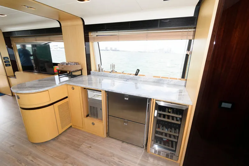 Slide: The Image of Luxurious interior of 2013 Azimut 84 Flybridge Motor Yacht with modern kitchen amenities. - 43