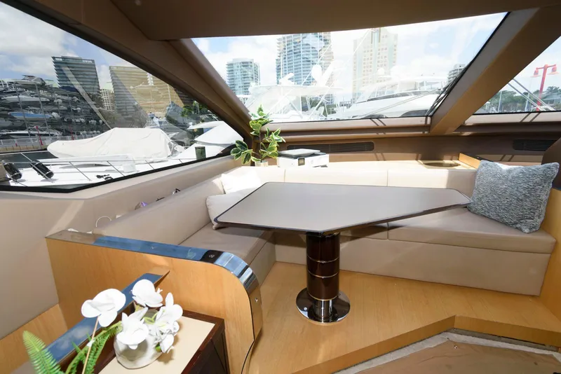 Slide: The Image of Luxurious interior of 2013 Azimut 84 Flybridge Motor Yacht with elegant seating and table. - 50