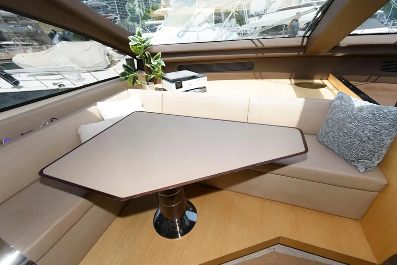 Slide: The Image of Luxurious interior of 2013 Azimut 84 Flybridge Motor Yacht with elegant seating and table. - 51