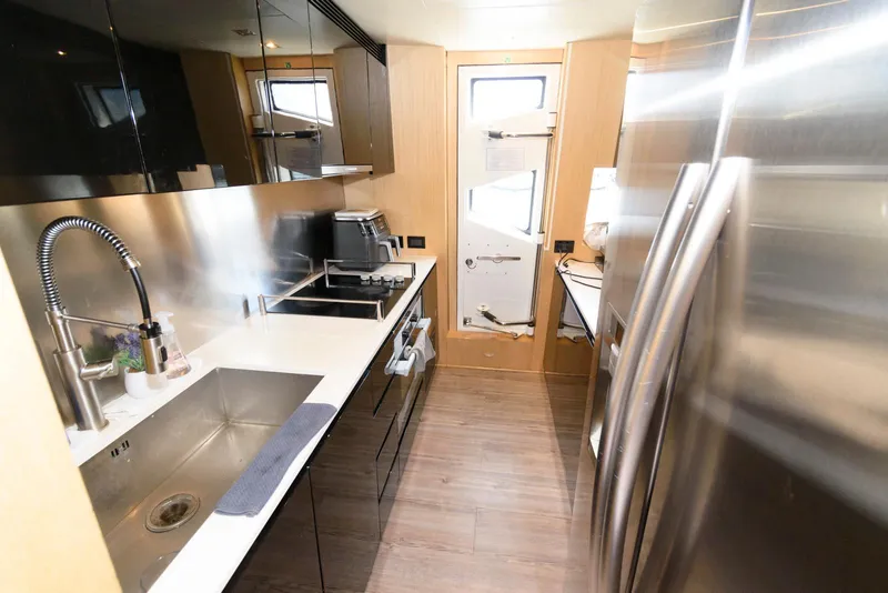 Slide: The Image of Modern kitchen in 2013 Azimut 84 Flybridge Motor Yacht with stainless steel appliances. - 54