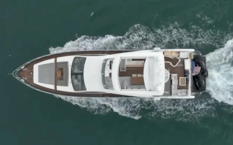 Slide: The Image of Overhead view of 2013 Azimut 84 Flybridge Motor Yacht cruising on water. - 8