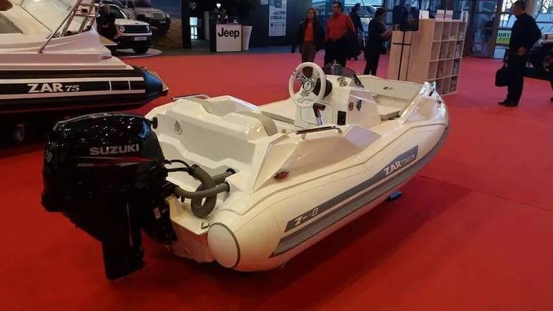 Slide: The Image of 2025 Zar Formenti ZF-0 inflatable boat with Suzuki engine on display. - 7