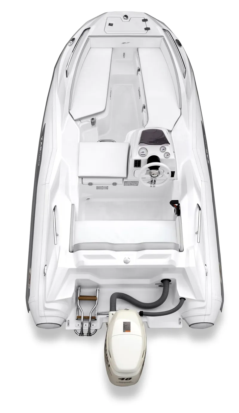 Slide: The Image of 2025 Zar Formenti ZF-2 boat, top view, sleek white design, modern outboard motor. - 4