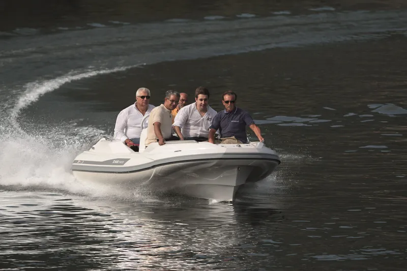 Slide: The Image of Five people enjoying a ride on a 2025 Zar Formenti ZF-3 boat. - 3