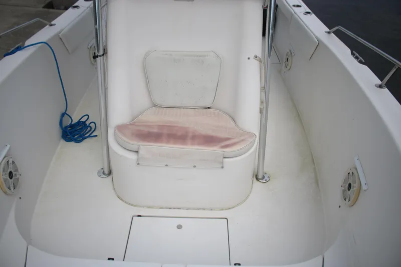 Slide: The Image of 2022 Skeeter SX2250 boat interior with seating and storage area. - 12