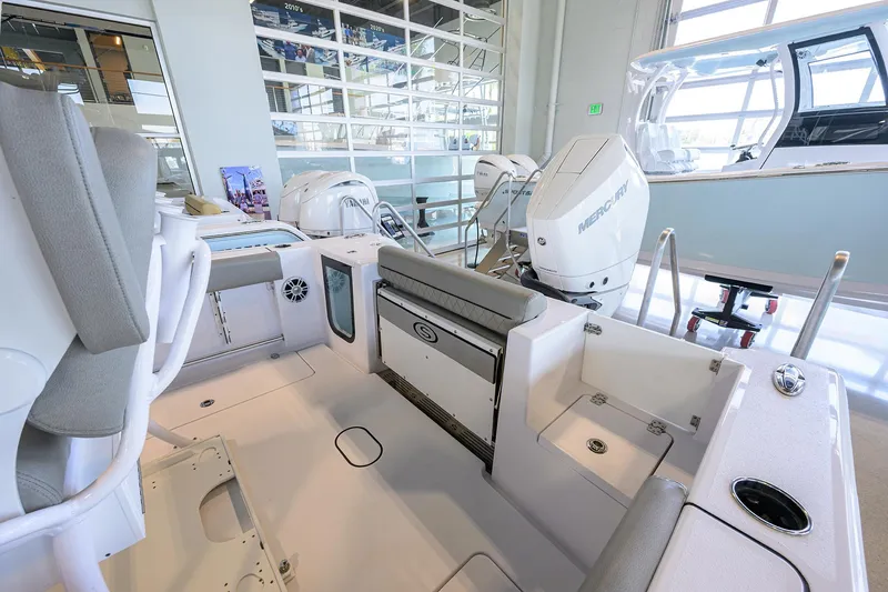Slide: The Image of 2024 Sportsman Open 252 Center Console boat interior with modern seating and equipment. - 15