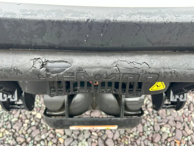 Slide: The Image of 2012 Sea-Doo GTX 155 rear view with visible wear and damage. - 17