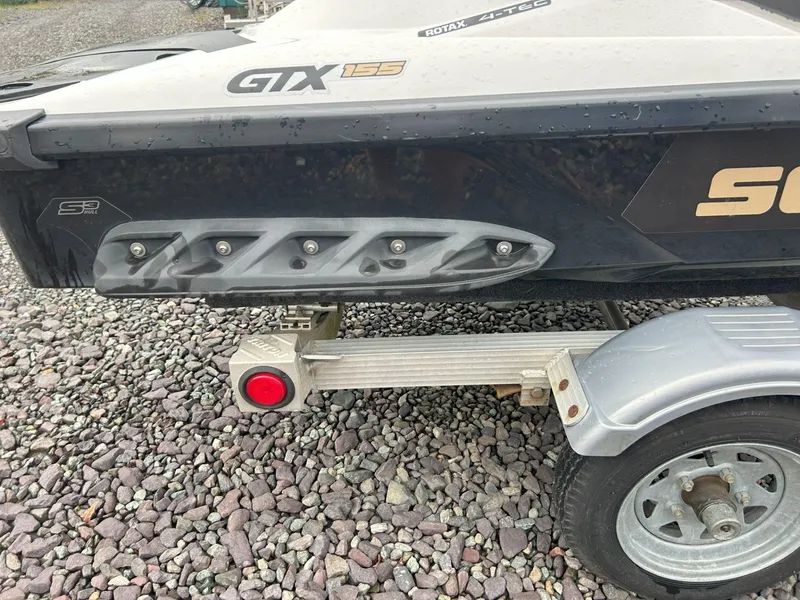 Slide: The Image of 2012 Sea-Doo GTX 155 on trailer, showcasing rear design and branding. - 20
