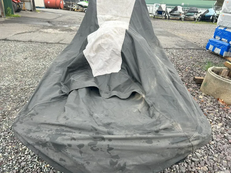 Slide: The Image of Covered 2012 Sea-Doo GTX 155 jet ski on gravel surface. - 39