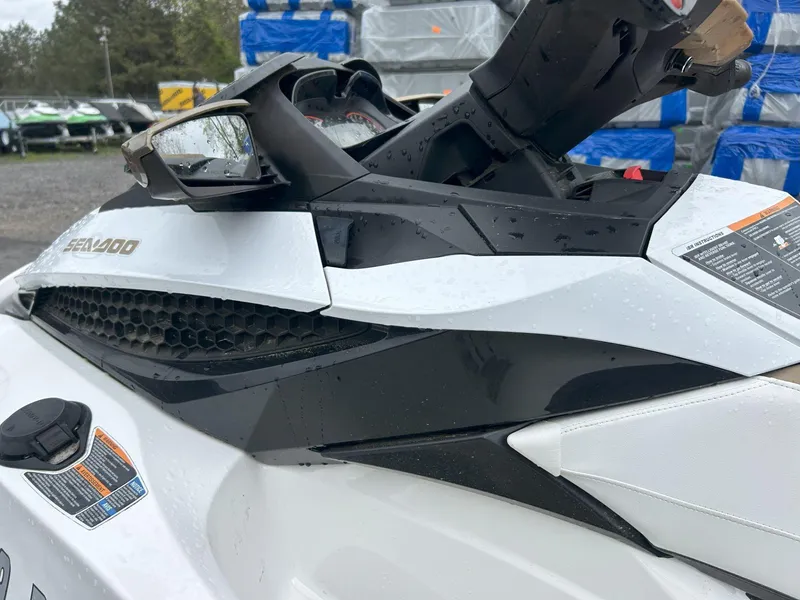 Slide: The Image of 2012 Sea-Doo GTX 155 jet ski, close-up view, showcasing sleek design and controls. - 6