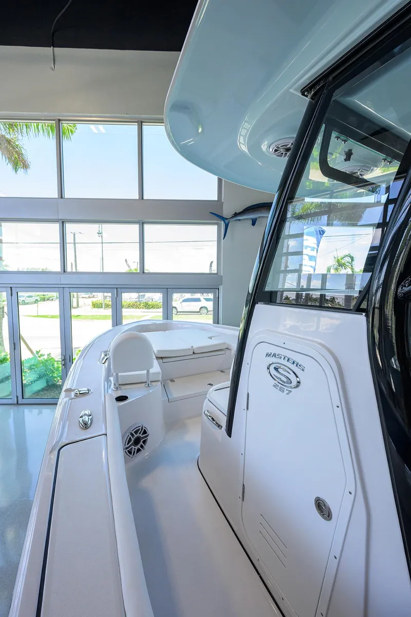 Slide: The Image of 2025 Sportsman Masters 267 Bay Boat interior, showcasing sleek design and modern features. - 4