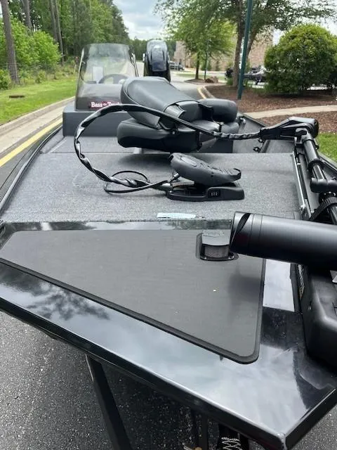 Slide: The Image of 2025 Tracker Bass Tracker Classic XL boat with fishing seats and equipment on deck. - 2