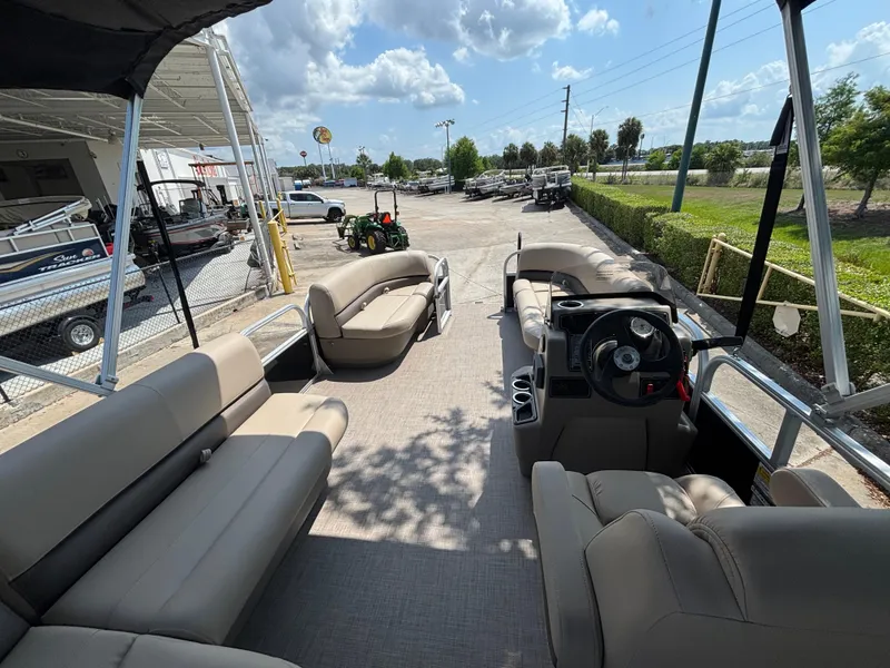 Slide: The Image of 2025 Sun Tracker Party Barge 16 DLX pontoon boat with spacious seating and modern design. - 3