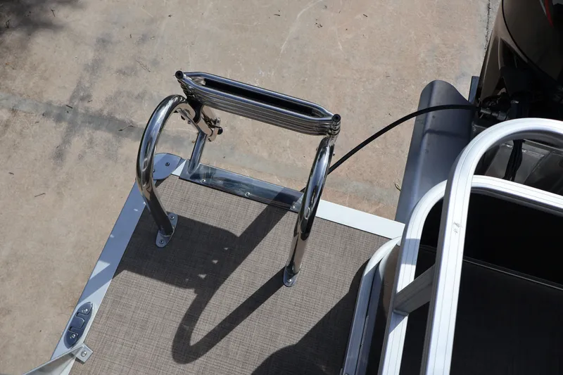 Slide: The Image of 2025 Sun Tracker Party Barge 18 DLX swim ladder and deck detail. - 33