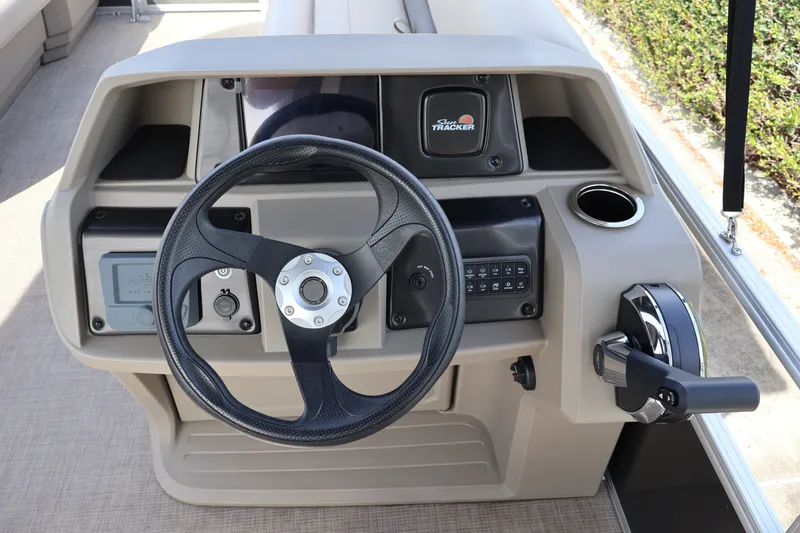 Slide: The Image of Steering console of 2025 Sun Tracker Party Barge 18 DLX pontoon boat. - 19